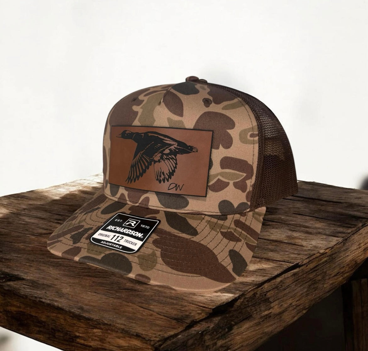 Dark camo duck patch hat